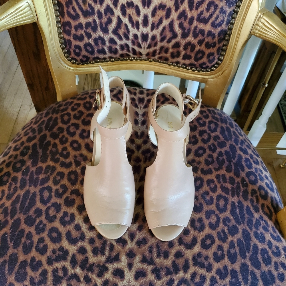 Nine West leather light tan sandals 6 1/2. Gently used.  Strap on ankle.